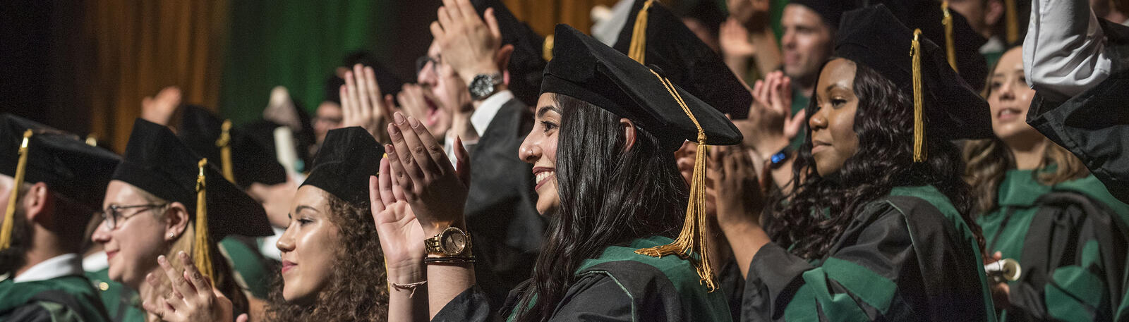 photo of happy graduates at commencement