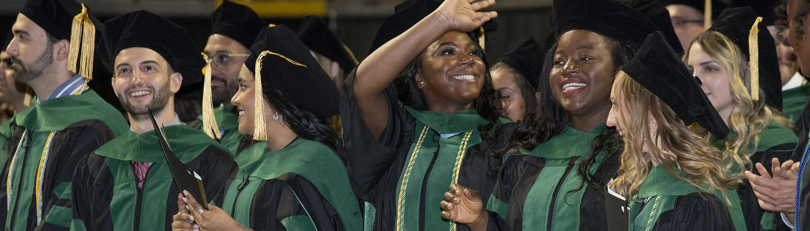 photo of happy graduates at commencement