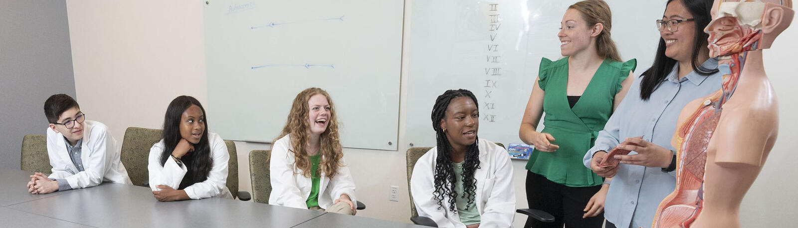 photo of students and instructors in a classroom