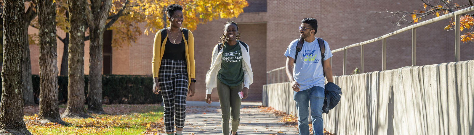 photo of students walking outside on campus