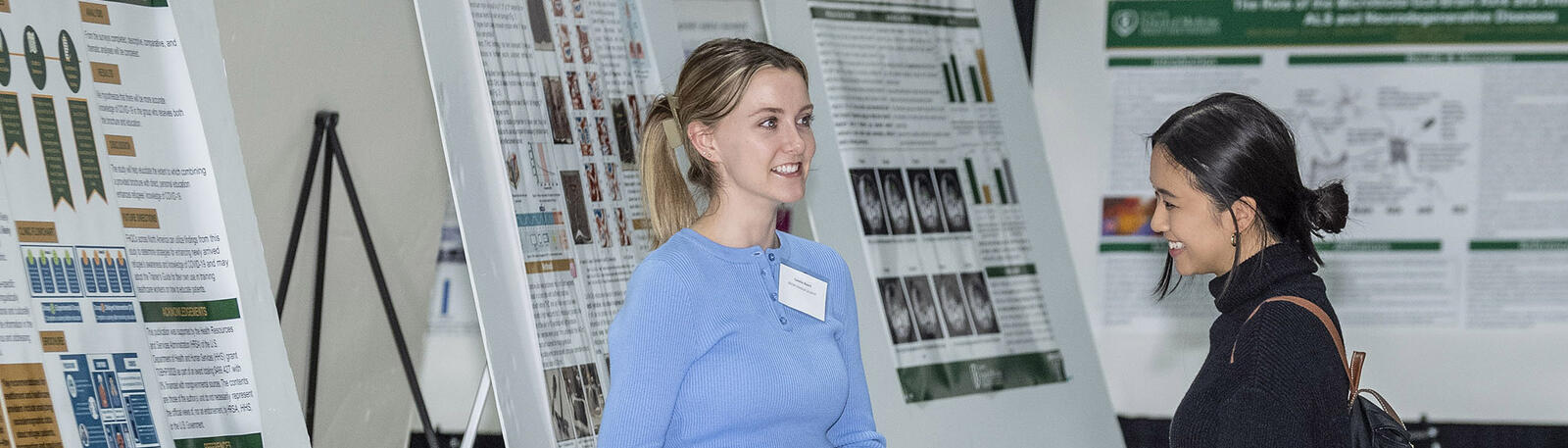 photo of students at a poster presentation