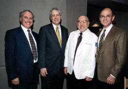 photo of (L-R) Boonshoft Chair Richard Schuster, WSU President Kim Goldenberg, Oscar Boonshoft, and Dean Howard Part