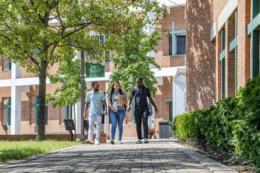 photo of students walking in front of the student union